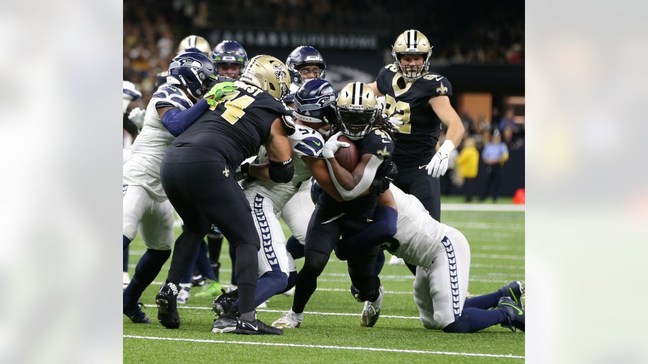 New Orleans Saints defensive end Cameron Jordan (94) celebrates after a  play during an NFL football game against the Seattle Seahawks, Sunday, Oct.  9, 2022, in New Orleans. (AP Photo/Tyler Kaufman Stock