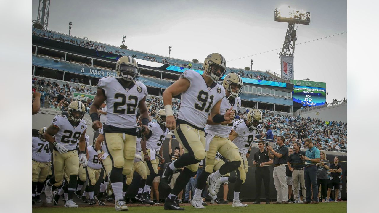 New Orleans Saints fans react to a replay call during the second half of an  NFL football game against the Jacksonville Jaguars, Sunday, Oct. 13, 2019,  in Jacksonville, Fla. (AP Photo/Stephen B.