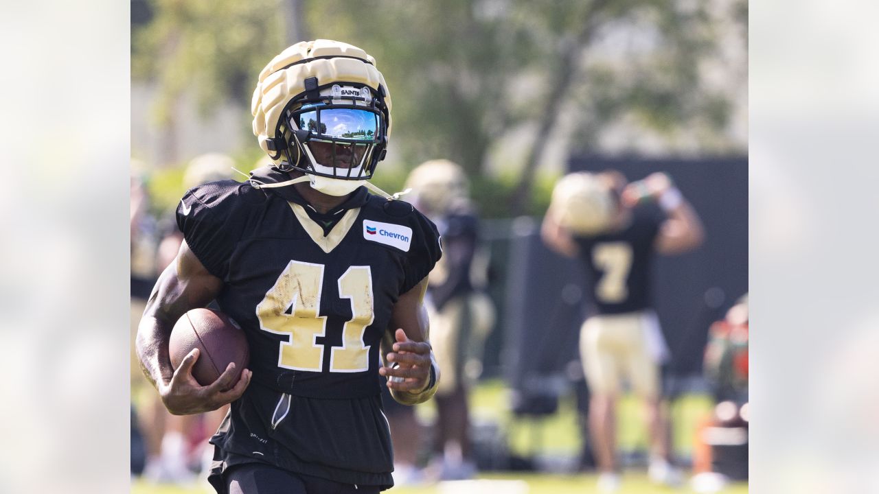 New Orleans Saints safety Smoke Monday (38) runs through drills in practice  during the Back Together Weekend fan appreciation initiative at the NFL  team's football training camp in Metairie, La., Saturday, July