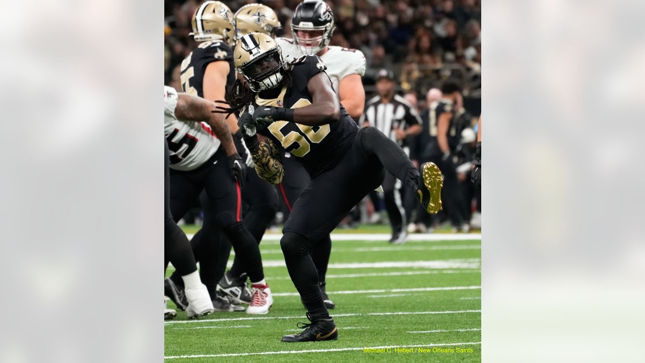 New Orleans, Louisiana, December 18, 2022. New Orleans Saints safety Justin  Evans (30) forces Atlanta Falcons wide receiver Drake London (5) into  fumbling the ball on a game-saving fourth down play late