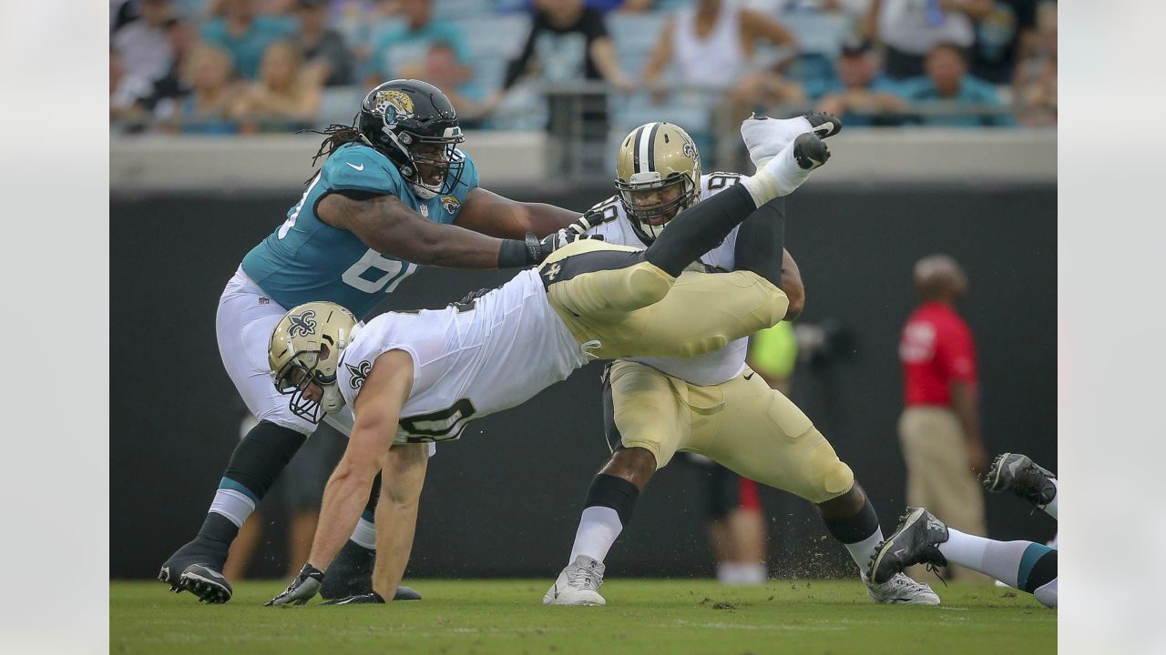 New Orleans Saints fans react to a replay call during the second half of an  NFL football game against the Jacksonville Jaguars, Sunday, Oct. 13, 2019,  in Jacksonville, Fla. (AP Photo/Stephen B.