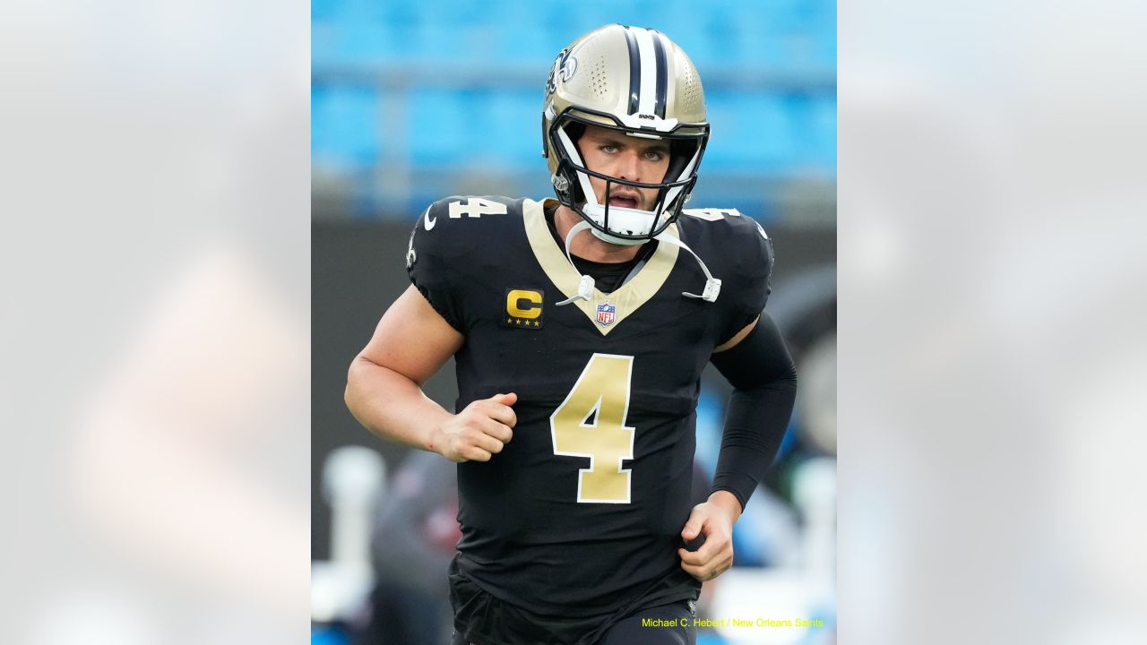 New Orleans Saints fans celebrate as a Carolina Panthers fan gives a thumbs  down sign during an NFL football game, Sunday, Sep. 25, 2022, in Charlotte,  N.C. (AP Photo/Brian Westerholt Stock Photo 