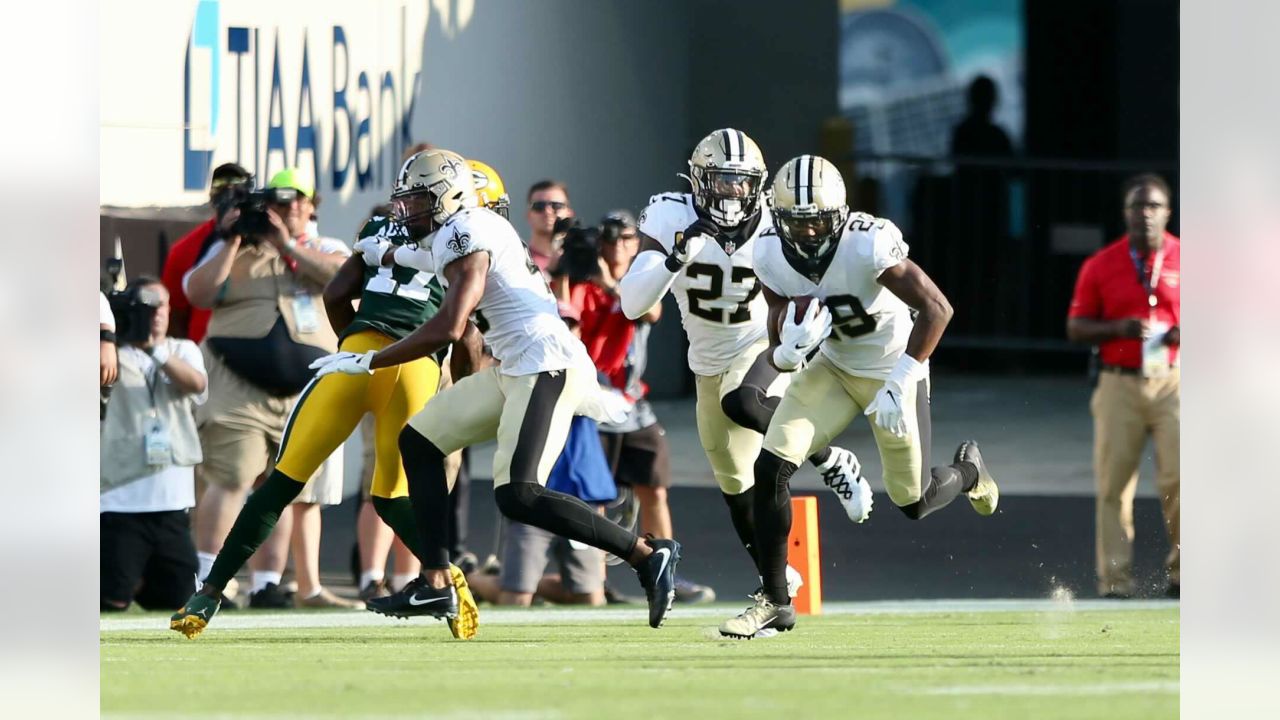 Fans dance to the band 'Bag of Donuts' in Champions Square before an NFL  football game between the New Orleans Saints and the Green Bay Packers in  New Orleans, Sunday, Oct. 26