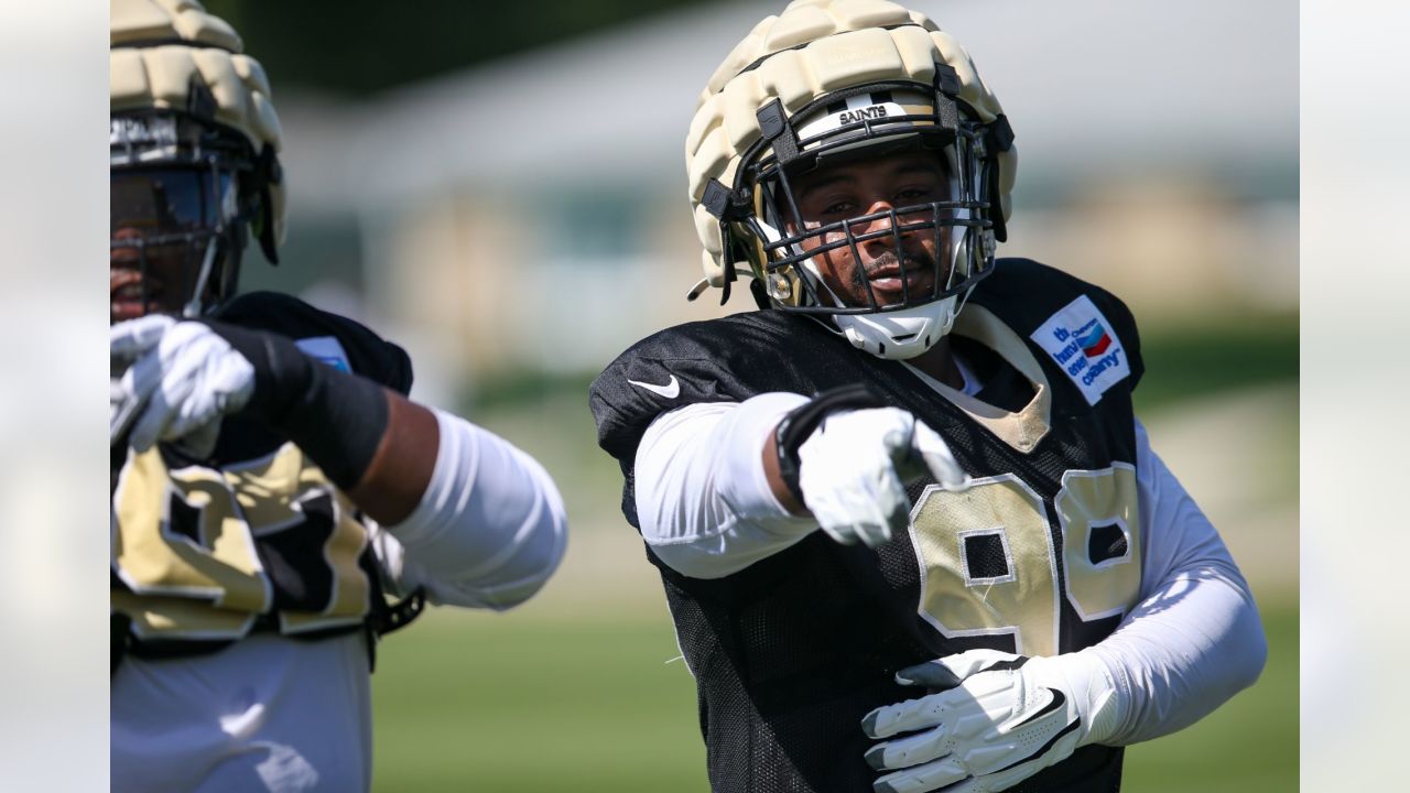 New Orleans Saints offensive tackle Trevor Penning (70) runs through drills  at the NFL team's football training camp in Metairie, La., Wednesday, Aug.  2, 2023. (AP Photo/Gerald Herbert Stock Photo - Alamy