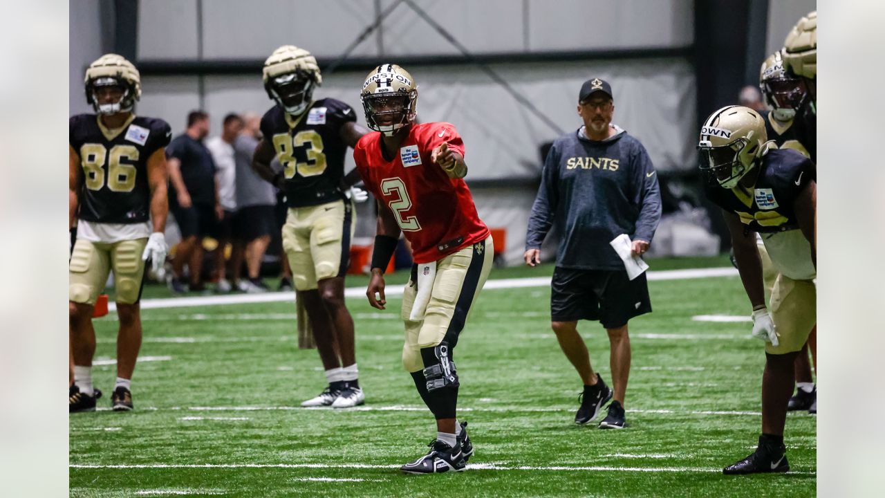 New Orleans Saints wide receiver Deonte Harty (11) wipes sweat from his  brow during training camp