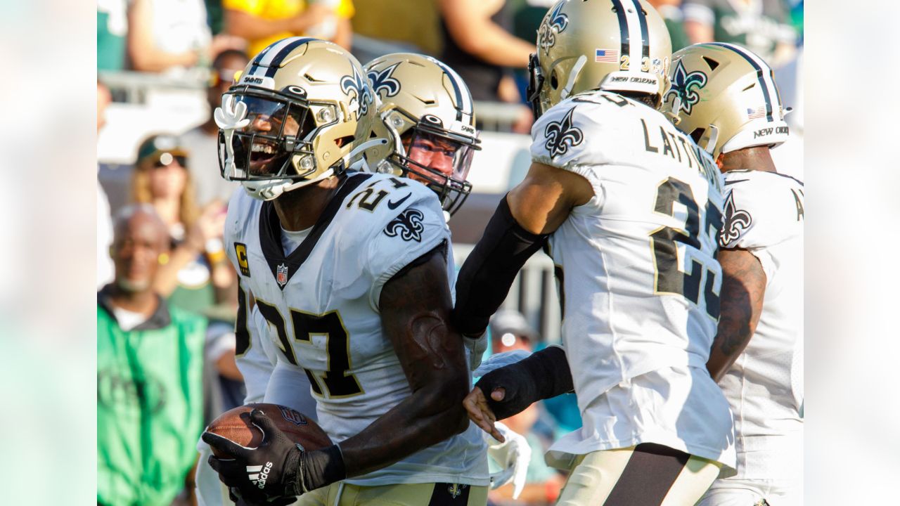 Green Bay Packers safety Shawn Davis (30) runs with the ball after a fumble  recovery during an NFL Preseason game against the New Orleans Saints  Friday, Aug. 19, 2022, in Green Bay