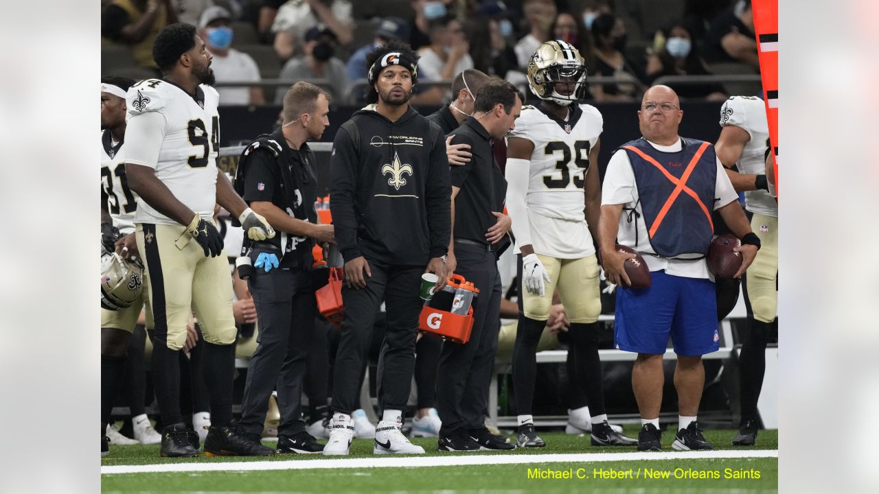 New Orleans Saints fans react to a replay call during the second half of an  NFL football game against the Jacksonville Jaguars, Sunday, Oct. 13, 2019,  in Jacksonville, Fla. (AP Photo/Stephen B.