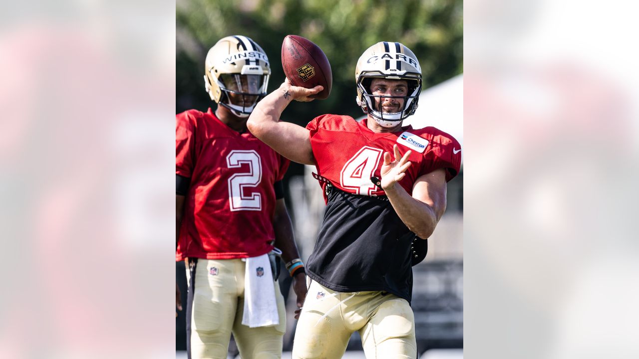 New Orleans Saints quarterback Jake Haener (14) runs through drills at the  NFL team's football training camp in Metairie, La., Friday, Aug. 4, 2023.  (AP Photo/Gerald Herbert Stock Photo - Alamy