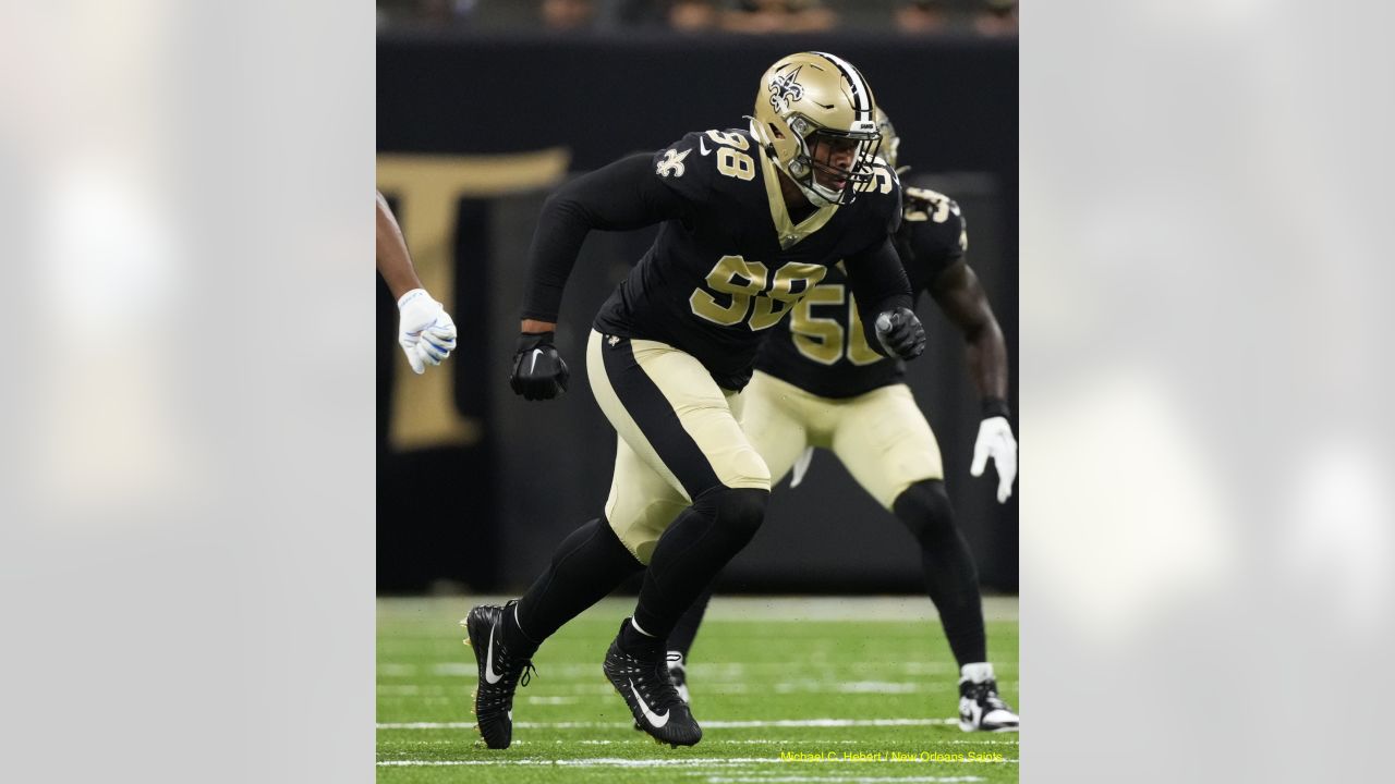 New Orleans Saints defensive end Payton Turner (98) and safety Tyrann  Mathieu (32) line up for a play in the first half of an NFL football game  against the Tennessee Titans in