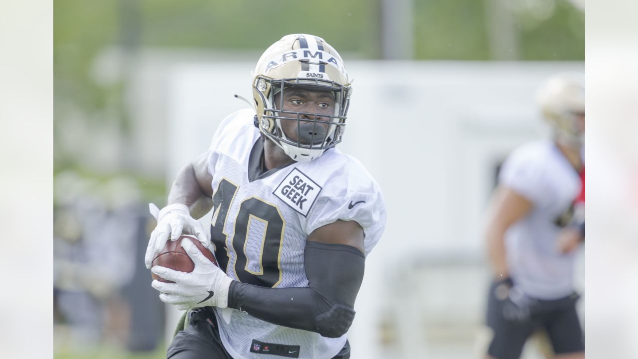 Marquez Callaway wears college No. 1 jersey at Saints pictures day