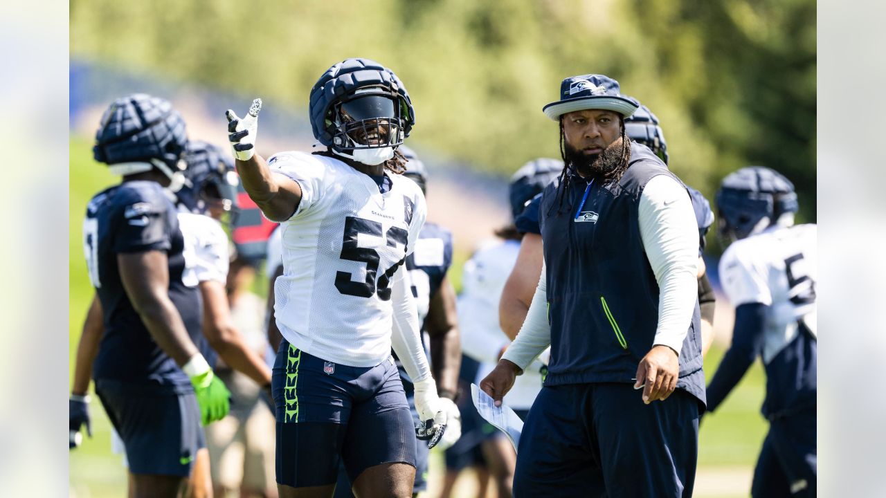 Seattle Seahawks' Darrell Taylor (52) looks into the backfield