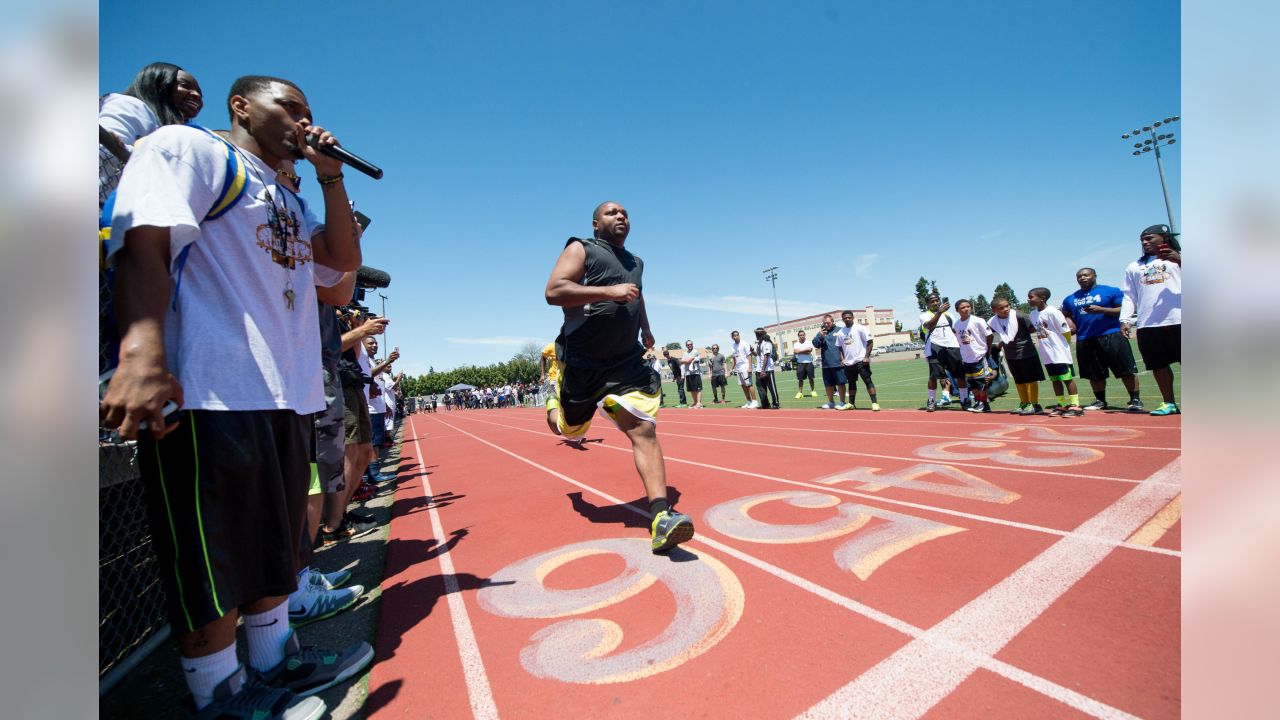 Marshawn Lynch Crushes A Kickball At Fam 1st Family Foundation