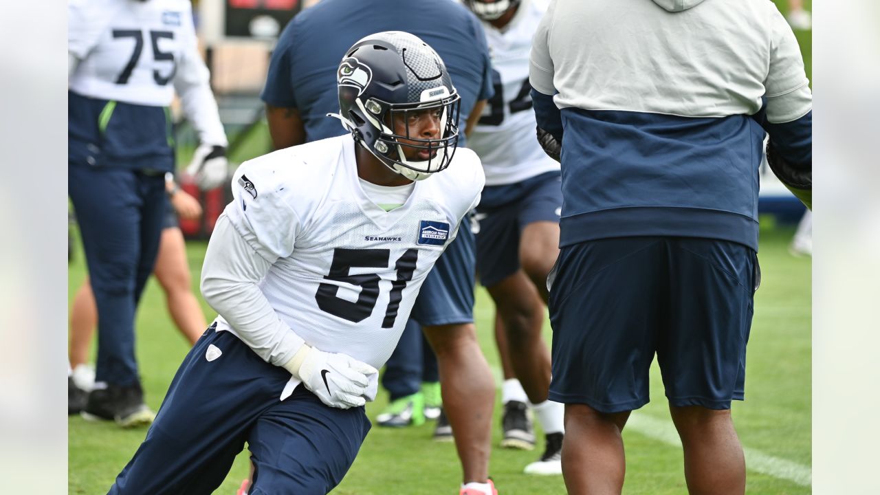 Seattle Seahawks defensive end L.J. Collier, center, in action against the  Denver Broncos during the second half of an NFL football preseason game,  Saturday, Aug. 21, 2021, in Seattle. The Broncos won