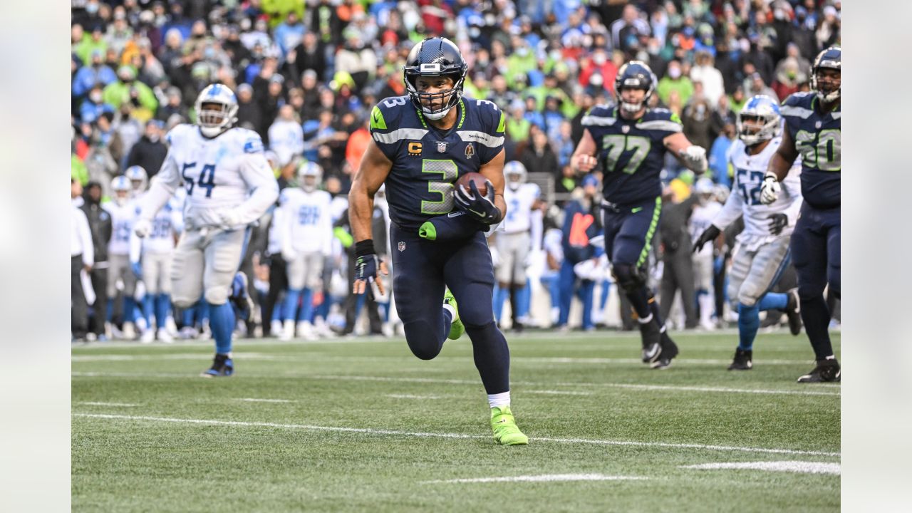 Seattle Seahawks quarterback Russell Wilson (3) greets wide receiver DK  Metcalf (14) during warmups before an NFL football game against the Tennessee  Titans, Sunday, Sept. 19, 2021, in Seattle. (AP Photo/John Froschauer