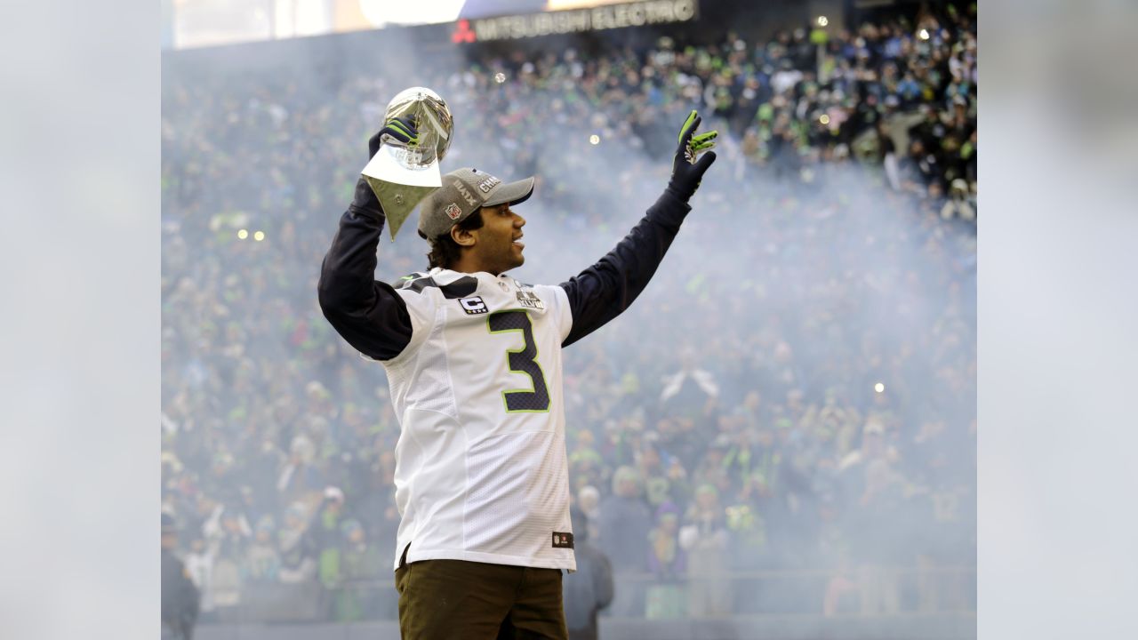 Seattle Seahawks quarterback Russell Wilson (3) lifts the Lombardi