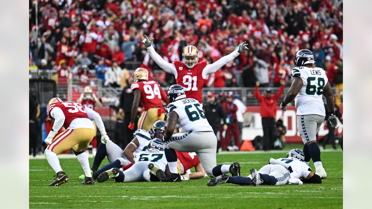 Seattle Seahawks defensive end Darrell Taylor (52) looks into the backfield  during an NFL football game against the San Francisco 49ers, Sunday, Sept.  18, 2022, in Santa Clara, Calif. (AP Photo/Scot Tucker