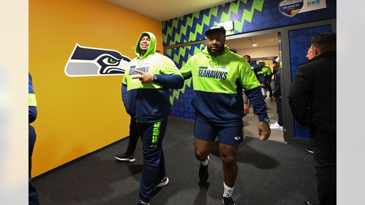 SEATTLE, WA - NOVEMBER 27: Seattle Seahawks defensive tackle Al Woods (99)  brings down Las Vegas Rai