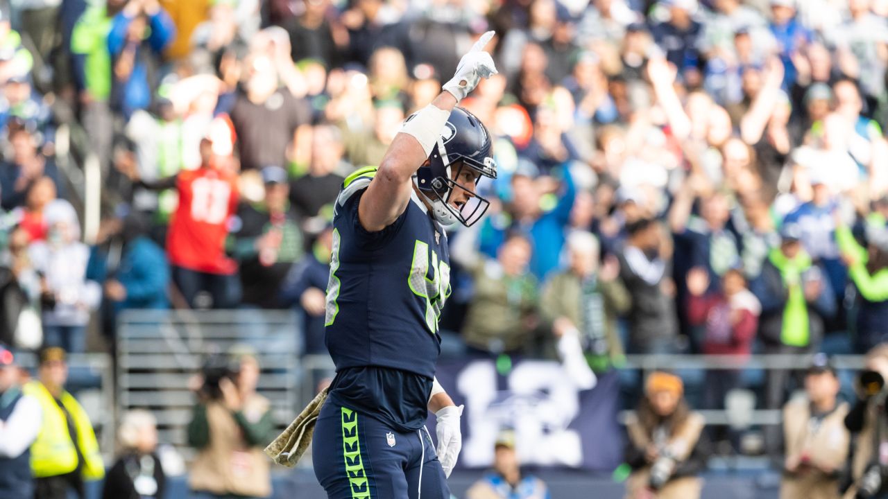 Seattle Seahawks quarterback Russell Wilson (3) greets tight end Jacob  Hollister, center, after Wilson passed to Hollister for touchdown against  the Tampa Bay Buccaneers during the first half of an NFL football