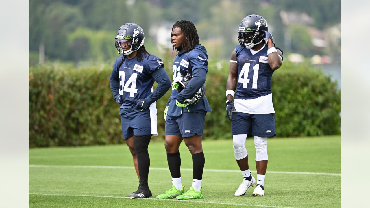 Seattle Seahawks defensive end L.J. Collier, center, in action against the  Denver Broncos during the second half of an NFL football preseason game,  Saturday, Aug. 21, 2021, in Seattle. The Broncos won