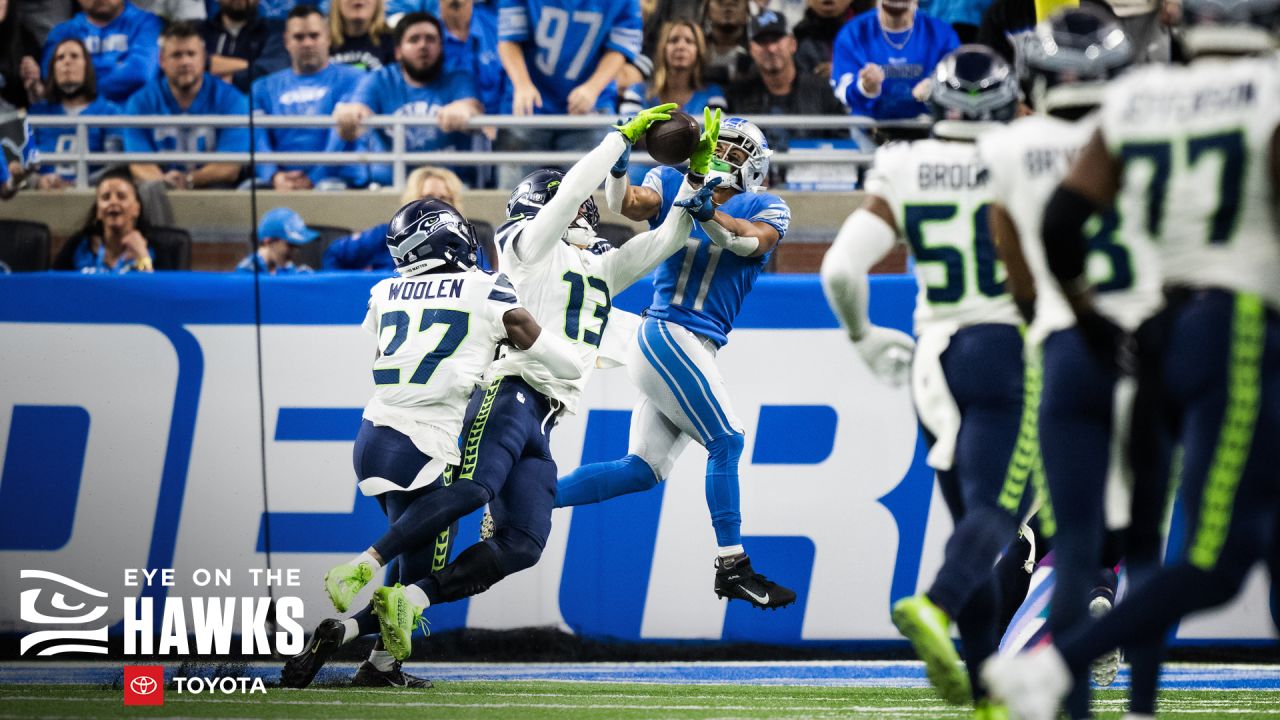 New Orleans Saints tight end Taysom Hill (7) carries for a first down  against Seattle Seahawks cornerback Tariq Woolen (27) during an NFL  football game in New Orleans, Sunday, Oct. 9, 2022.