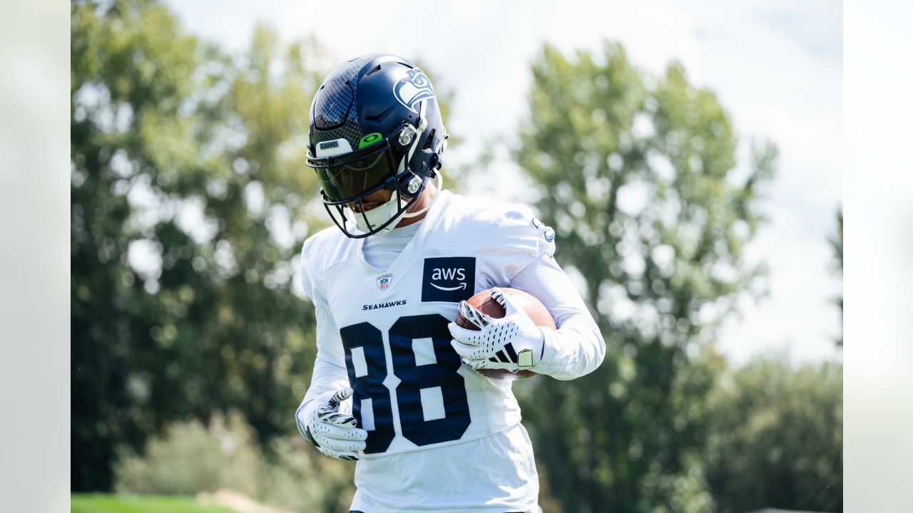 November 14, 2021: Seattle Seahawks safety Jamal Adams (33) and outside  linebacker Jordyn Brooks (56) tackle Green Bay Packers running back A.J.  Dillon (28) during the NFL football game between the Seattle