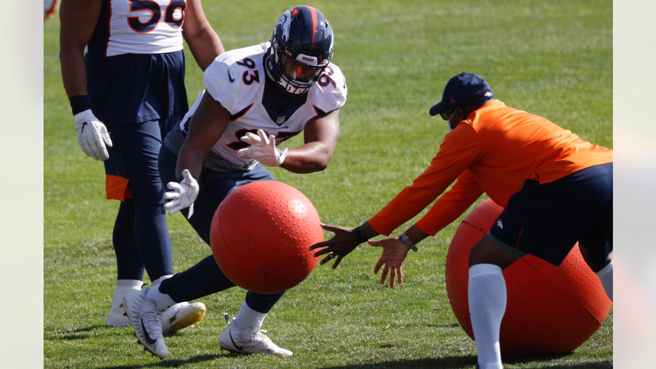 Denver Broncos defensive end Dre'Mont Jones takes part in drills