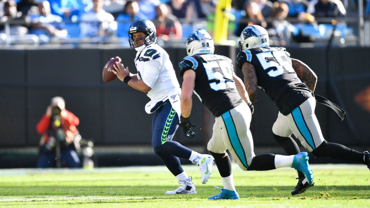 Carolina Panthers cornerback Donte Jackson breaks up a pass intended for  Seattle Seahawks wide receiver Tyler Lockett during the first half of an  NFL football game Sunday, Sept. 24, 2023, in Seattle. (