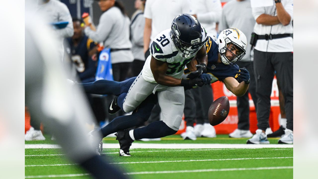 Seattle Seahawks running back Kenneth Walker III (9) wears customized  cleats before an NFL football game against the Los Angeles Rams, Sunday,  Dec. 4, 2022, in Inglewood, Calif. (AP Photo/Kyusung Gong Stock