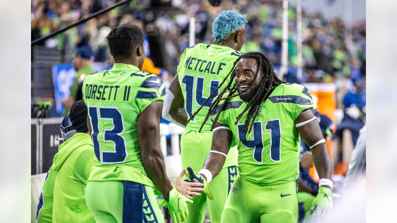 Seattle Seahawks' Alex Collins (41) celebrates a TD during an NFL