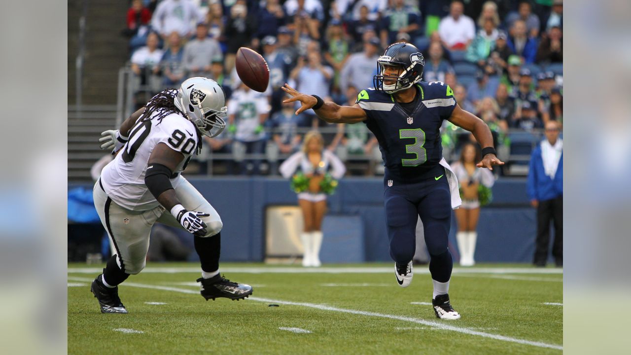 Seattle Seahawks running back Alex Collins carries the ball against the  Denver Broncos during the first half of an NFL football preseason game,  Saturday, Aug. 21, 2021, in Seattle. (AP Photo/John Froschauer