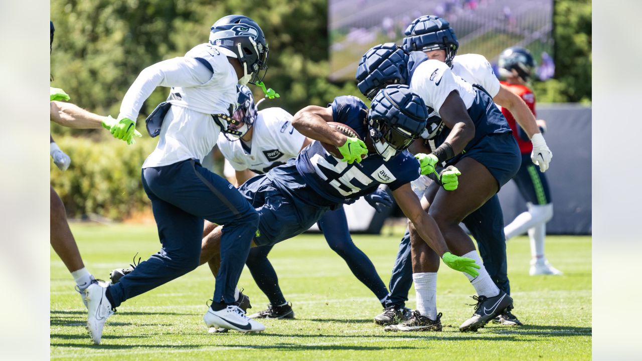 Seattle Seahawks - Lock taking time to meet with our military at practice  yesterday. Salute to service moment presented by USAA #SaluteToService