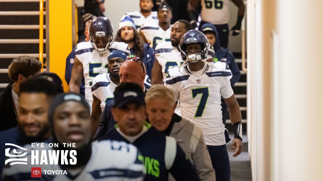 Seattle Seahawks guard Damien Lewis, left, celebrates with head