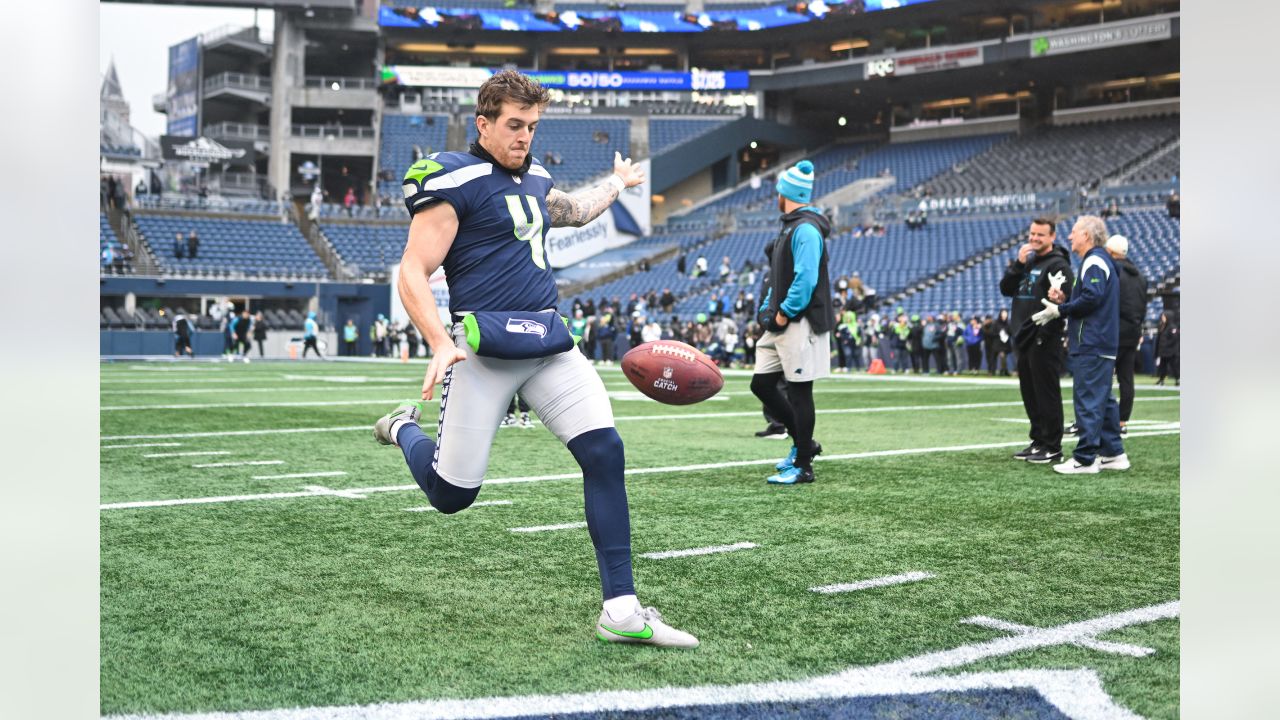 Seattle Seahawks wide receiver Tyjon Lindsey (81) holds a football while  running a receiving drill during the NFL football team's training camp,  Wednesday, July 26, 2023, in Renton, Wash. (AP Photo/Lindsey Wasson