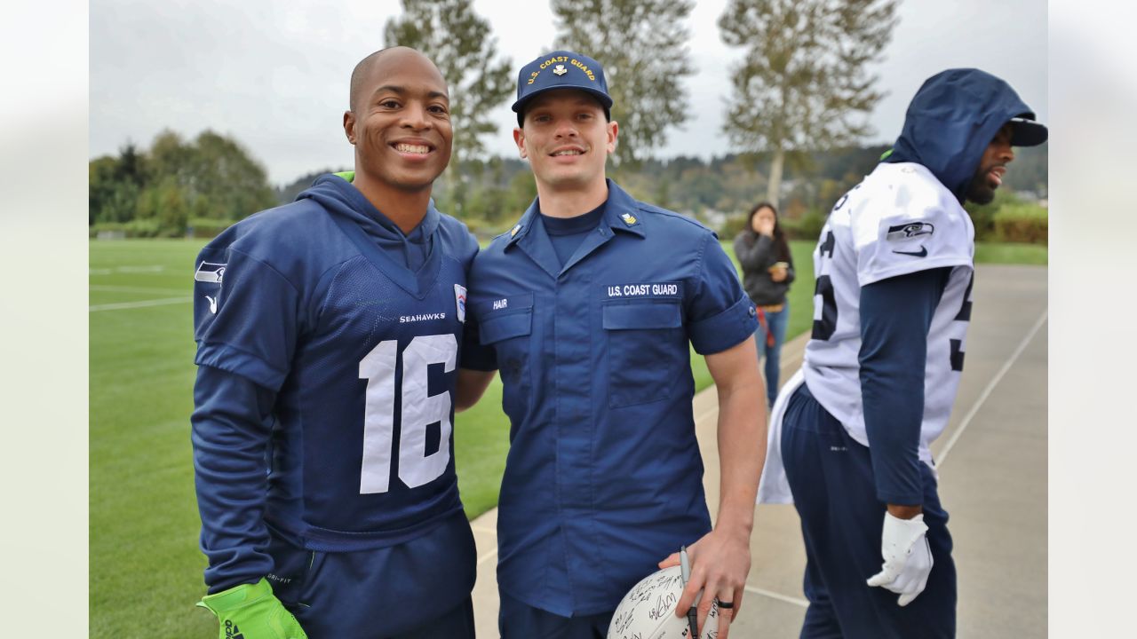 U.S. Air Force recruits are sworn in during halftime on Salute to Service  military appreciation day at an NFL football game between the Jacksonville  Jaguars and the Las Vegas Raiders, Sunday, Nov.