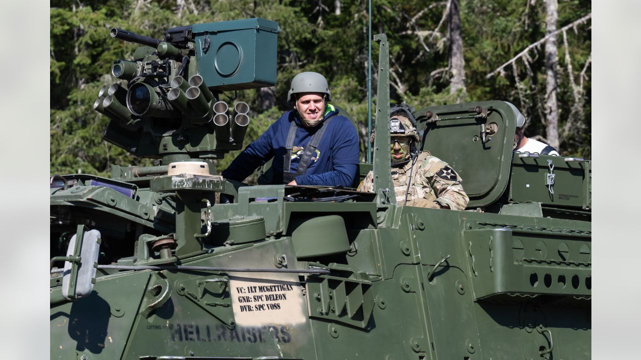 Seahawks, Falcons players visit JBLM, Article