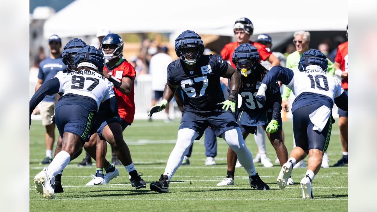Seahawks end day before training camp with flurry of roster moves and  restructured contract