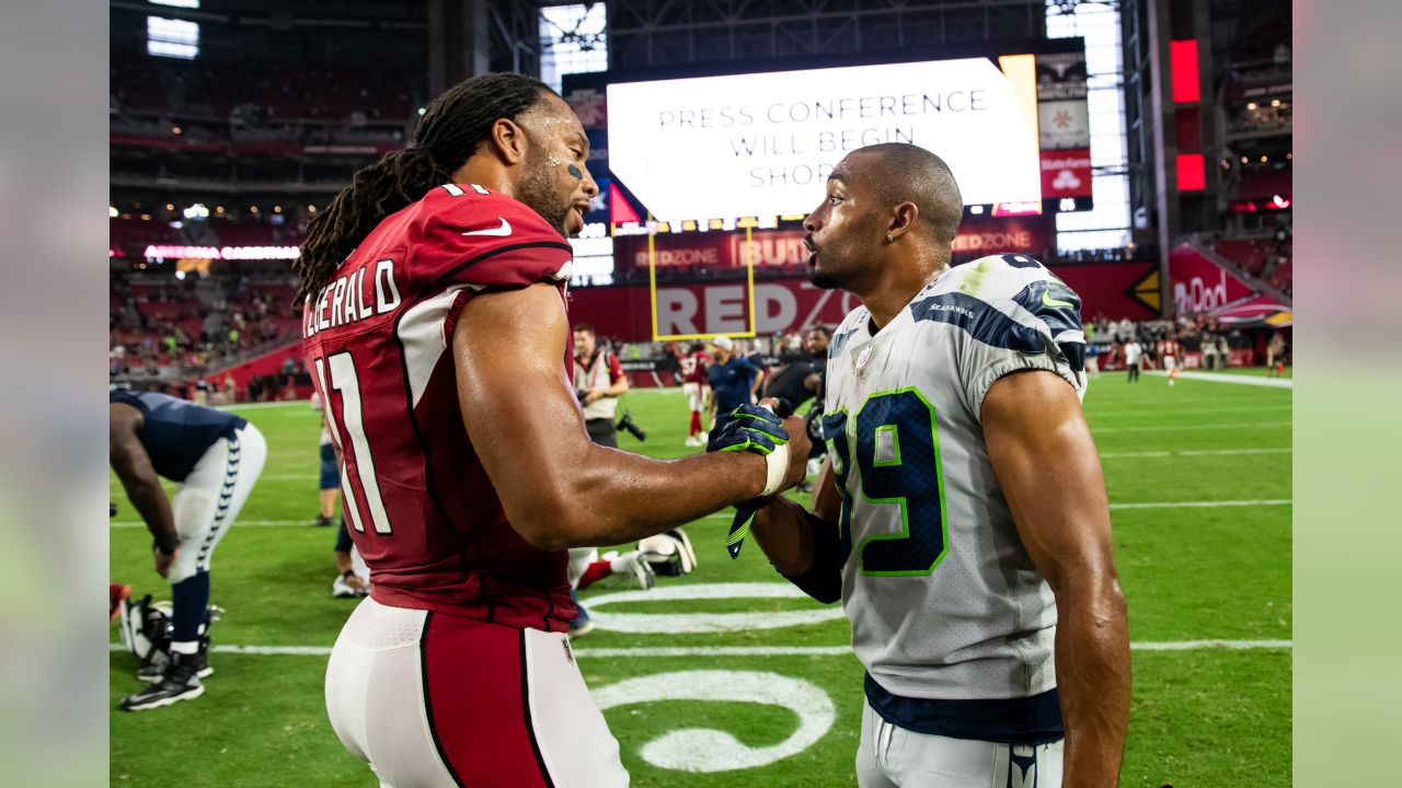 December 2, 2018: Seattle Seahawks wide receiver Jaron Brown (18) prepares  to stiff arm a defender during a game between the San Francisco 49ers and  the Seattle Seahawks at CenturyLink Field in