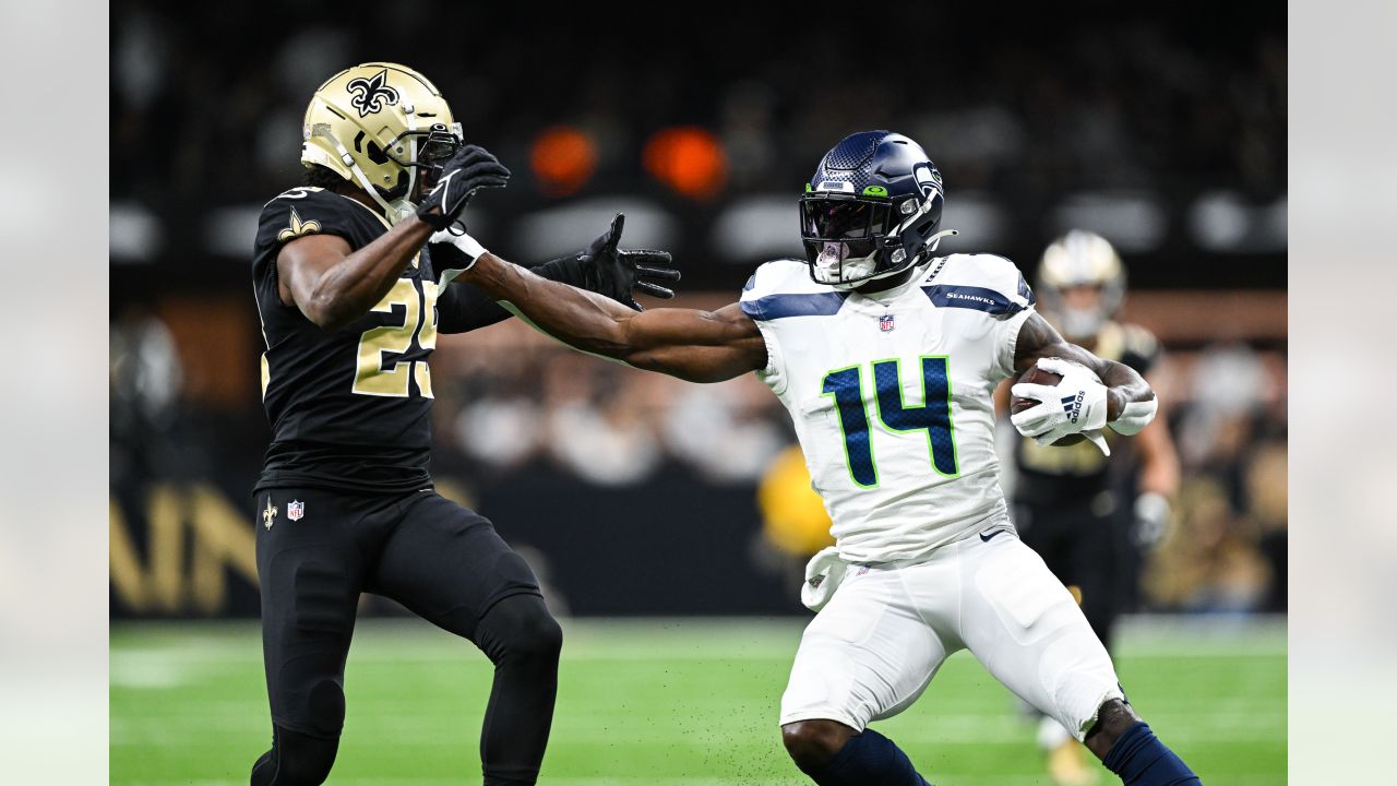 Seattle Seahawks running back Tony Jones Jr. (32) runs with the ball before  an NFL football game against the Los Angeles Chargers, Sunday, Oct. 23,  2022, in Inglewood, Calif. (AP Photo/Kyusung Gong