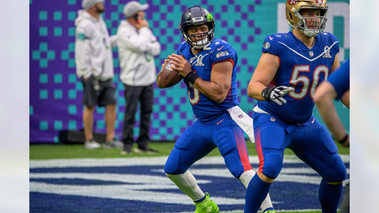 Russell Wilson receives 2022 Bart Starr Award at the Super Bowl Breakfast