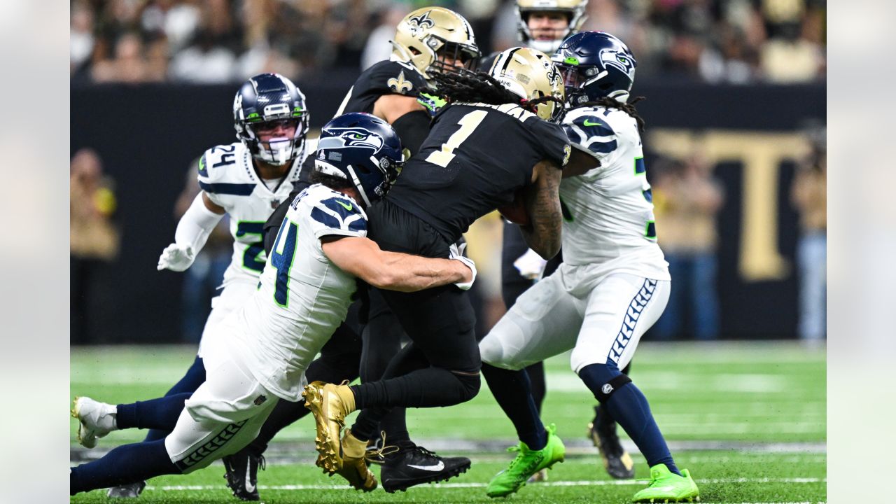 Seattle Seahawks running back Tony Jones Jr. (32) runs with the ball before  an NFL football game against the Los Angeles Chargers, Sunday, Oct. 23,  2022, in Inglewood, Calif. (AP Photo/Kyusung Gong