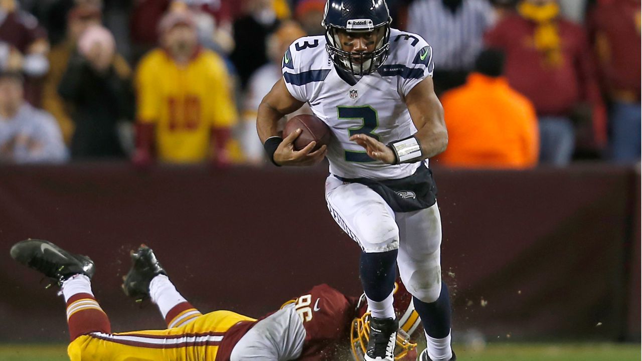 Raiders running back B.J. Emmons (35) goes up top and crosses the goal line  as Seattle Seahawks …