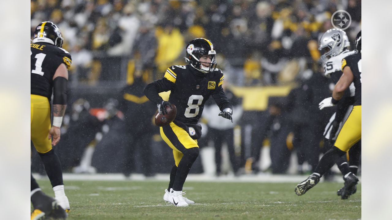 PITTSBURGH, PA - DECEMBER 24: Pittsburgh Steelers quarterback Kenny Pickett  (8) looks to pass during the national football league game between the Las  Vegas Raiders and the Pittsburgh Steelers on December 24