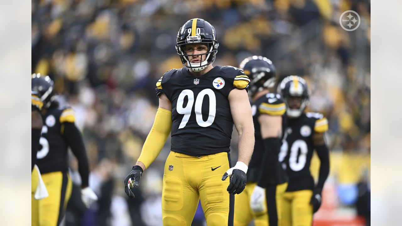 Anthony Brown of the Baltimore Ravens is sacked by T.J. Watt of