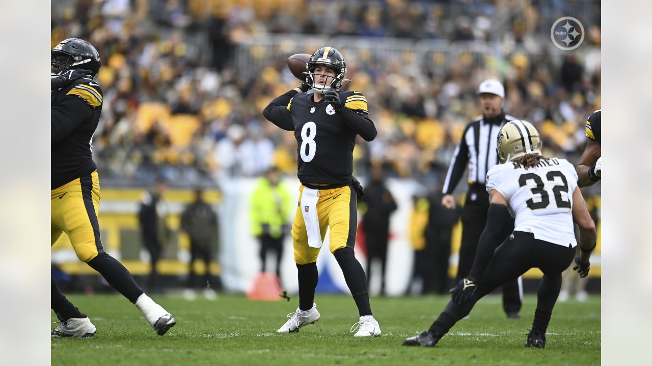 PITTSBURGH, PA - NOVEMBER 20: Pittsburgh Steelers quarterback Kenny Pickett  (8) calls a play in the huddle during the national football league game  between the Cincinnati Bengals and the Pittsburgh Steelers on