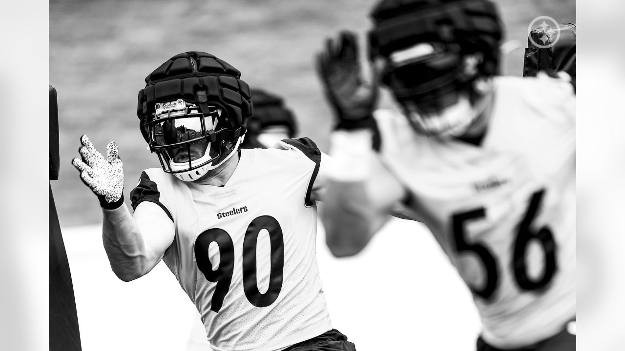 Check out Steelers LB T.J. Watt as he signs a baby at training camp