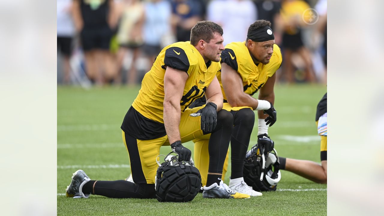 Check out Steelers LB T.J. Watt as he signs a baby at training camp