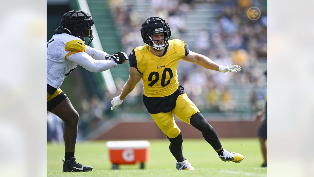 Check out Steelers LB T.J. Watt as he signs a baby at training camp