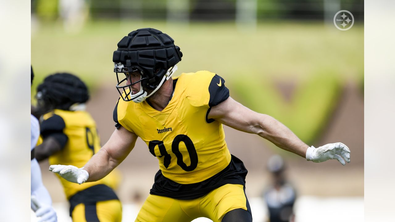 Check out Steelers LB T.J. Watt as he signs a baby at training camp