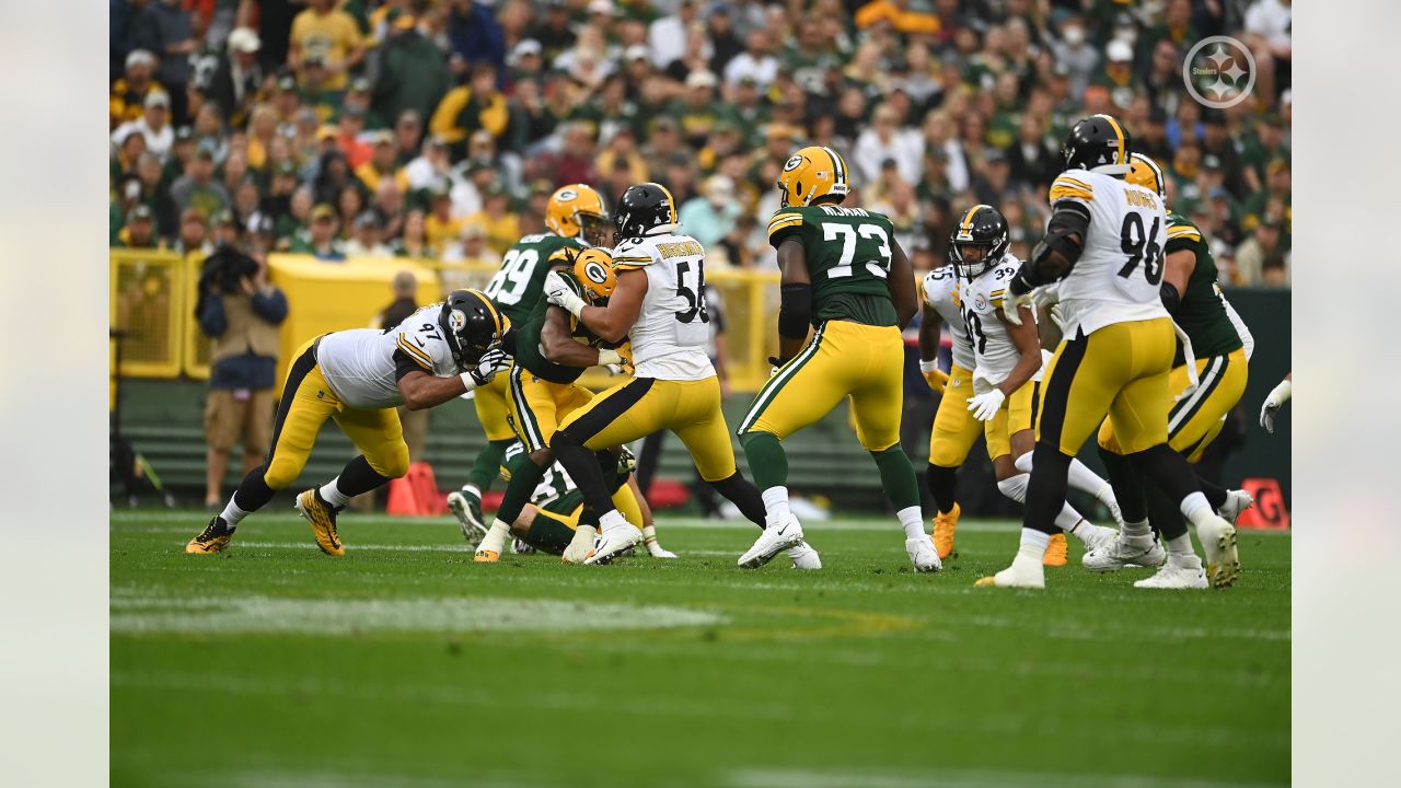 BALTIMORE, MD - DECEMBER 19: Packers running back A.J. Dillon (28) runs the  ball during the Green Bay Packers versus Baltimore Ravens NFL game at M&T  Bank Stadium on December 19, 2021