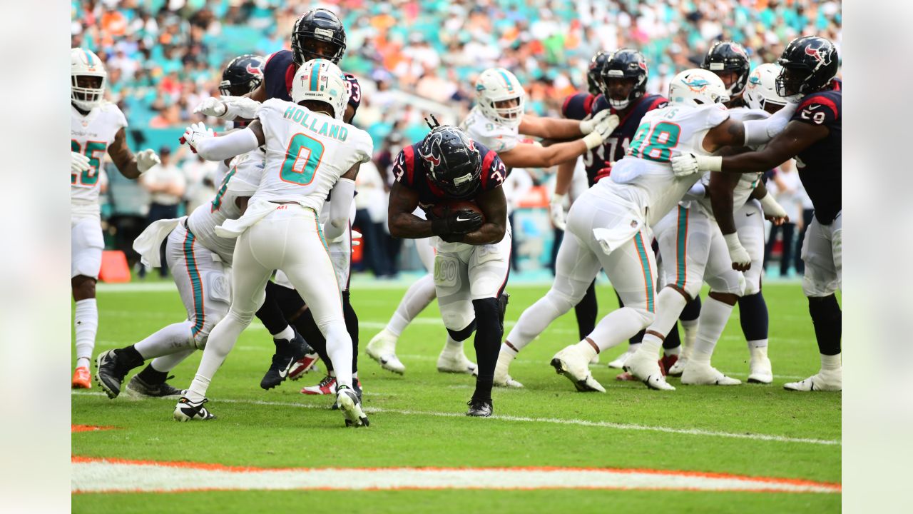 The Houston Texans fell 30-15 to the Miami Dolphins in a game in two  lopsided halves of football.